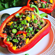 Quinoa Stuffed Bell Peppers (Vegan) 10 large bell peppers, tops removed and seeded 5 cups cooked quinoa 2 cups black beans, drained and rinsed 2 cups corn 2 cups salsa 2 cups chopped cilantro Salt and pepper, to taste Preheat oven to 375°F. In a large bowl, mix quinoa, black beans, corn, salsa, and cilantro. Season with salt and pepper. Stuff the bell peppers with the quinoa mixture and place them in a baking dish. Bake for 30-40 minutes, until peppers are tender and the filling is heated through.