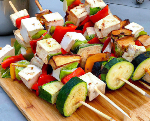 Vegetable and Tofu Skewers (Vegan) 2 cups cubed firm tofu 2 cups cherry tomatoes 2 cups sliced bell peppers 2 cups sliced zucchini 2 cups sliced red onion 1/4 cup olive oil 1/4 cup soy sauce 1/4 cup balsamic vinegar Salt and pepper, to taste Preheat grill or grill pan to medium-high heat. Thread tofu, cherry tomatoes, bell peppers, zucchini, and red onion onto skewers. In a small bowl, whisk together olive oil, soy sauce, and balsamic vinegar. Season with salt and pepper. Brush skewers with the marinade and grill for 10-12